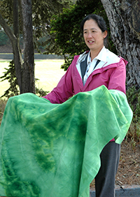 Pam Su, director of campus recreation, displays the fabric